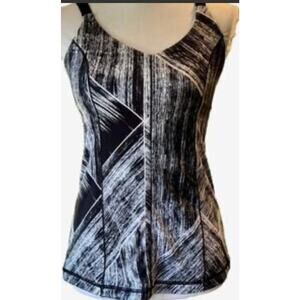 Lululemon Hot to Street tank Heatwave Open Criss-Cross back design purple.